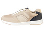 Beige sneakers met zwarte accenten.