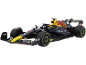 Zwart-gele Formule 1-speelgoedauto.