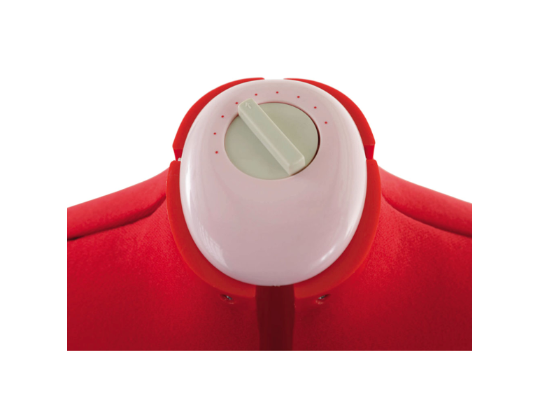 Detail van een rood-witte kookwekker met een draaiknop en indicatorpunten.