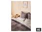 LIVARNO home beddengoed met bladmotief in een slaapkamer. [AI-gegenereerde afbeelding]