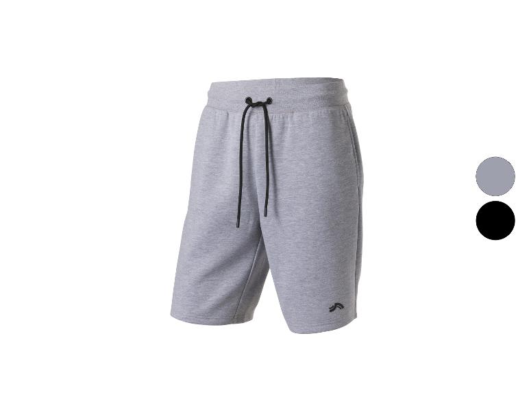 Grijze joggingbroek met zwart trekkoord en logo op de pijp, ook verkrijgbaar in zwart.