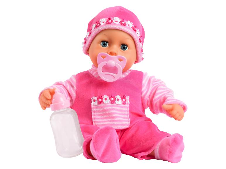 Roze babypop met speen en fles.