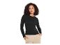 Vrouw in zwarte longsleeve en beige broek, opzij kijkend.