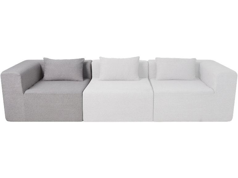 Modulaire driezitsbank met kussens, één grijs en twee witte modules.