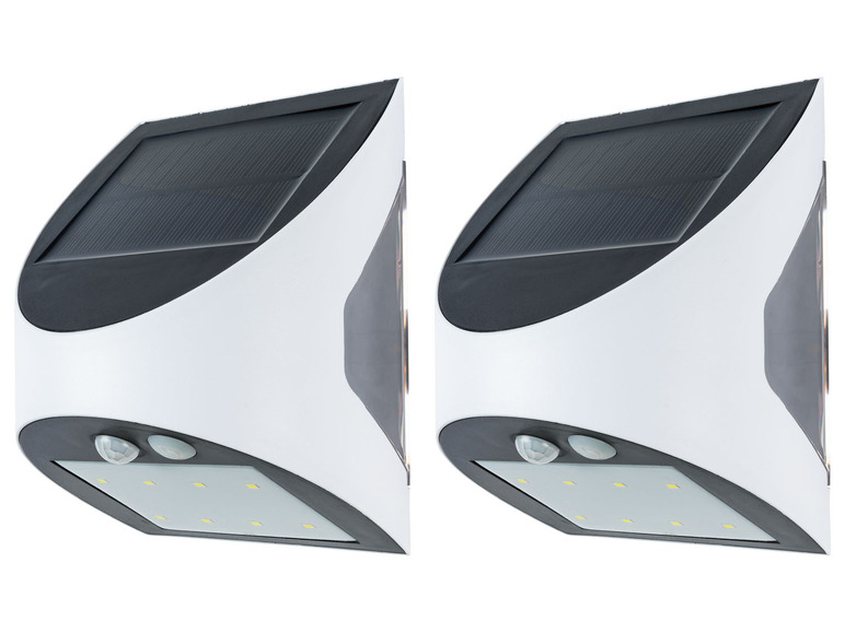 Twee witte solar LED-buitenlampen met bewegingssensor.