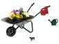 Parkside kruiwagen met bloemen, gereedschap, handschoenen en gieter.
