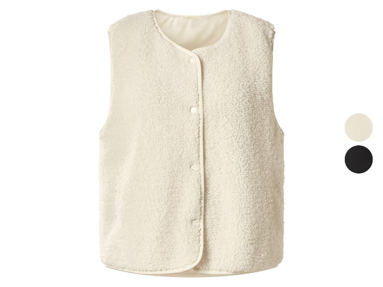 Beige fleecevest met knopen, met kleuropties beige en zwart.