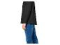 Zwarte jas en blauwe jeans, zijaanzicht