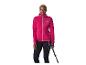 Vrouw in roze fleecejack en zwarte legging met wandelstokken.