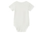 Witte baby romper met korte mouwen.