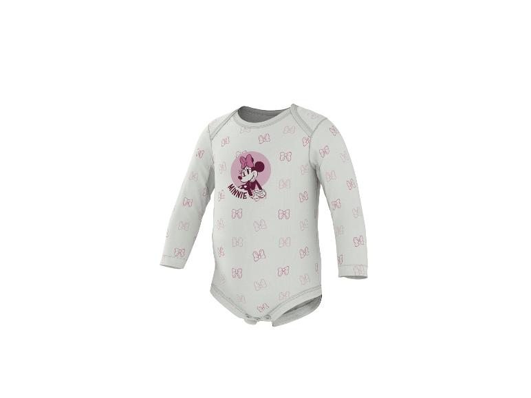 Wit babyrompertje met lange mouwen, Minnie Mouse-motief en roze strikjes.