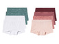 Een setje met witte, groene en roze onderbroeken.