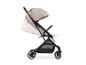 Beige Hauck Travel N Care kinderwagen met zwart frame en wielen