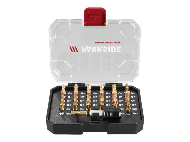Schroevendraaierbitset met transparante koffer, inclusief diverse maten en een adapter.