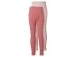 Twee kinderleggings, één effen roze en één lichtroze met stippen.