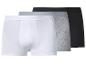 Drie herenboxershorts in wit, grijs en zwart.
