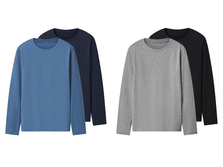 Vier longsleeve T-shirts in blauw, marineblauw, grijs en zwart.
