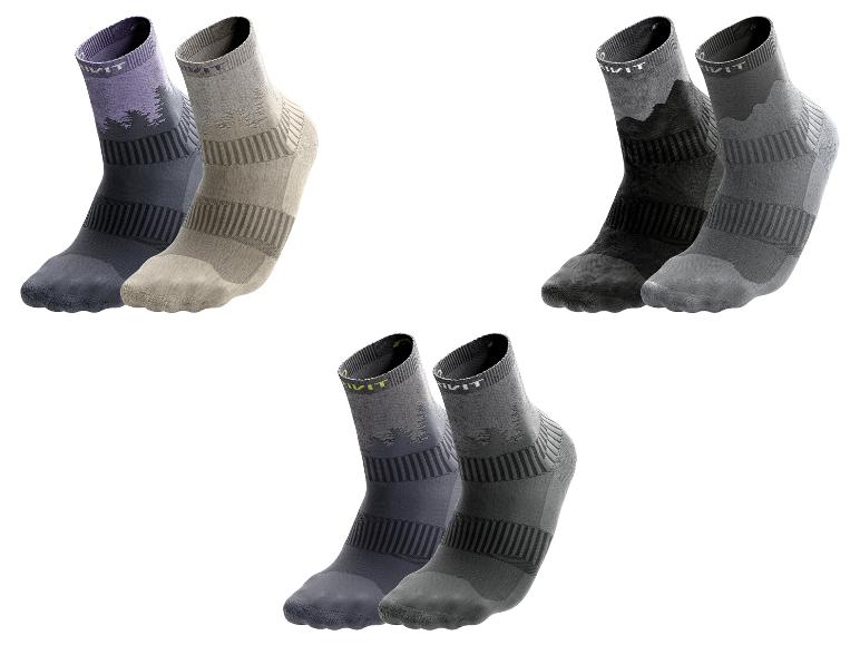 Drie paar Crivit merk sokken in diverse kleuren en patronen.