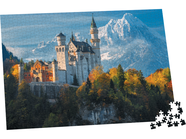 Legpuzzel met een afbeelding van slot Neuschwanstein in de herfst met bergen op de achtergrond.