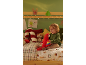 Kind zit op een kerstversierd bed te spelen met een pluche papegaai.