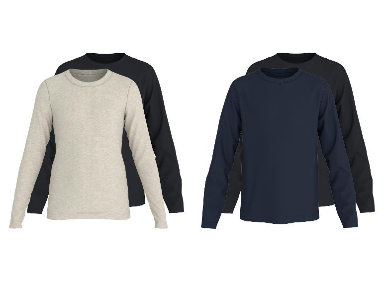 Twee sets heren longsleeves: beige en zwart, en marineblauw en zwart.