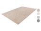 Beige tapijt met golvend patroon en kleurstalen