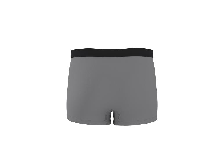Grijze boxershort met zwarte elastische tailleband.