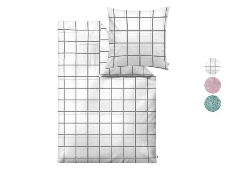 Wit geruit beddengoed met kussensloop, met opties voor stippen en geometrische patronen.