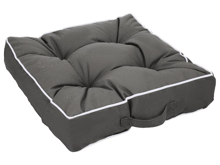 Donkergrijs gecapitonneerd zitkussen met witte bies en draaglus.