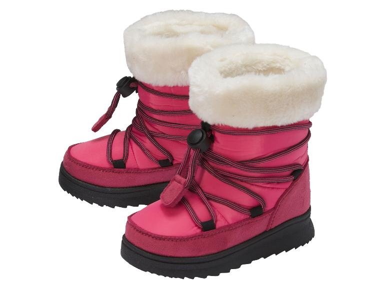 Roze kinderlaarzen met wit bont en zwarte veters.