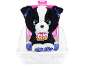 Zwart-witte pluche hond met blauwe glitterdetails in een witte reismand