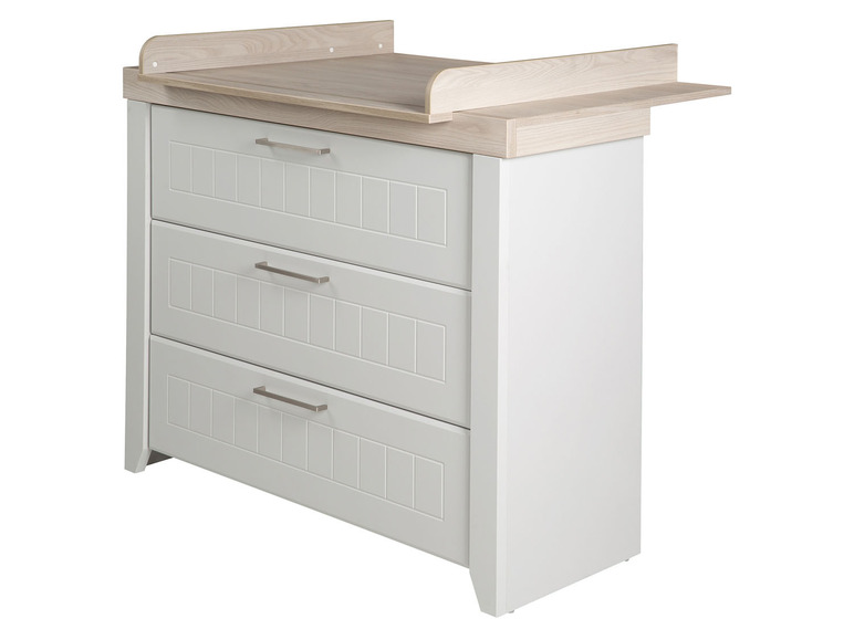 Witte commode met drie laden en een verschoningsblad.