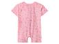 Roze babyromper met korte mouwen en pijpen, voorzien van een subtiel bloemenpatroon.