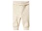 Lichtbeige geribbelde babybroek met een brede, omvouwbare tailleband en boorden bij de enkels.