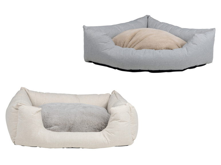 Twee hondenbedden in grijs en beige met een pluche binnenkant.