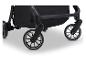 Onderste deel van een zwarte kinderwagen met wielen en vering.