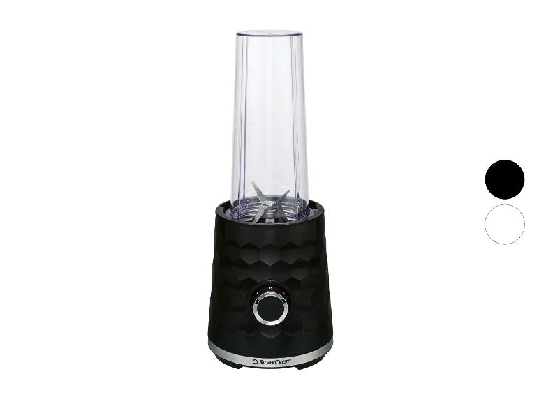 Zwarte persoonlijke blender met een getextureerde honingraatbasis en een doorzichtige beker.