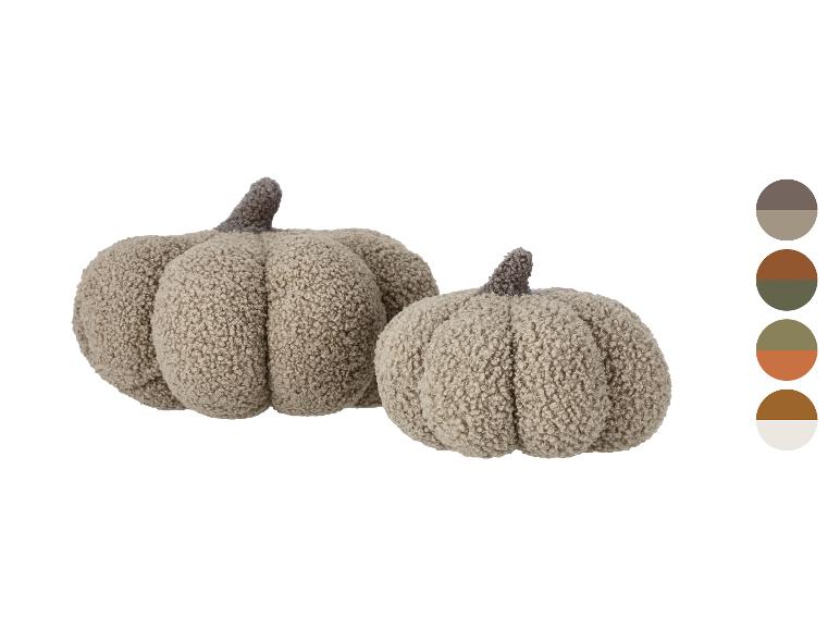 Twee zachte, beige decoratieve pompoenen met bruine stelen en kleurenpalet.