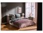 Tweepersoonsbed met LIVARNO home jersey hoeslaken in een moderne slaapkamer.