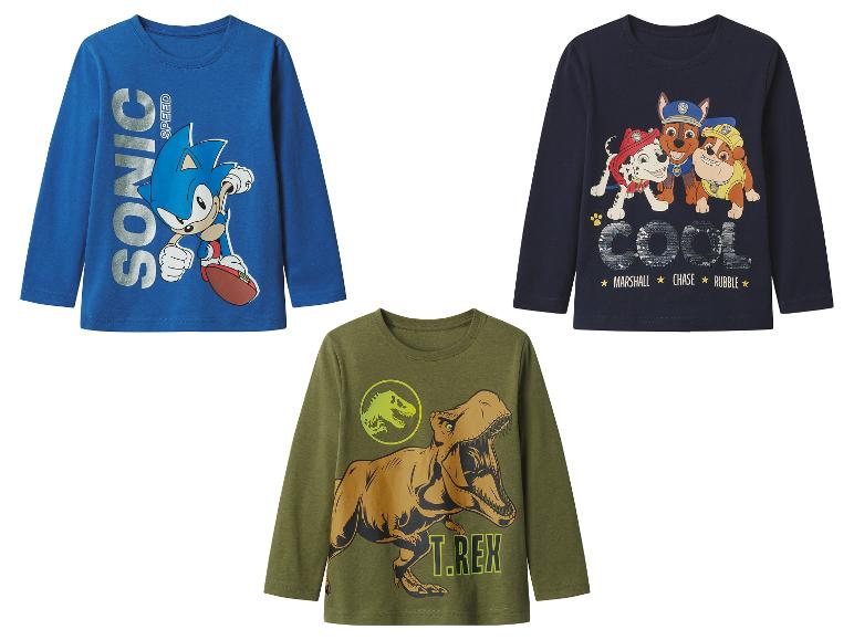 Drie shirts met lange mouwen: Sonic, Paw Patrol en Jurassic Park.