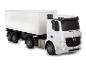 Wit model van een Mercedes-Benz Actros vrachtwagen met aanhanger.