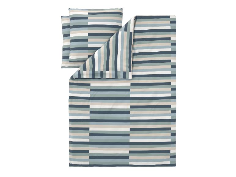 Dekbedovertrekset met horizontale en verticale strepen in blauw, beige en wit.