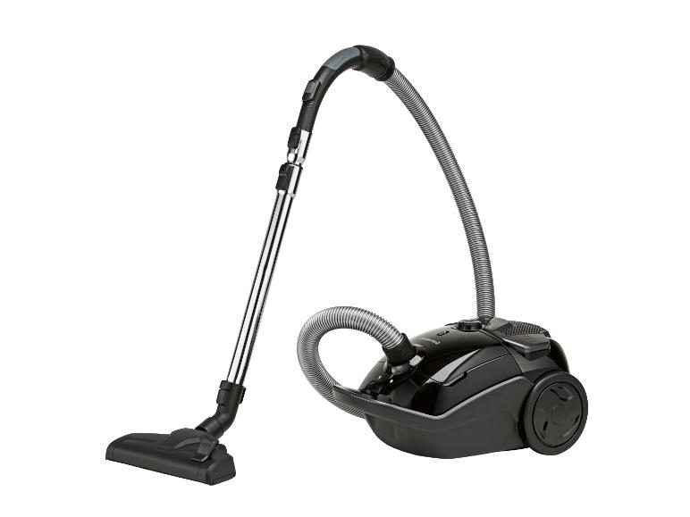 Zwarte sledestofzuiger met metalen handvat en slang.