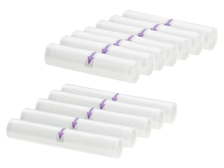 Twee rijen witte vacuümzakrollen met paarse pijlaanduidingen.