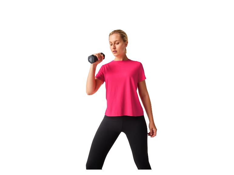 Vrouw in roze en zwarte sportkleding met Crivit dumbbells.