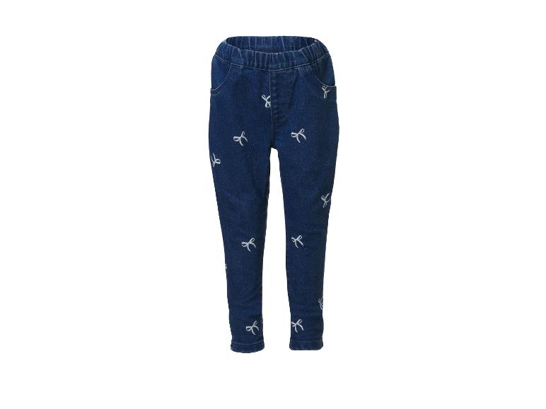 Meisjesjeans met witte strikjesprint, elastische taille en zakken.