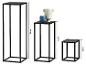Set van drie zwarte metalen sokkels in verschillende hoogtes (90 cm, 60 cm, 30 cm) met vazen.