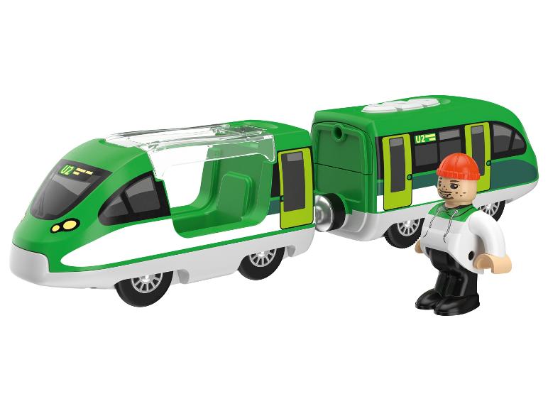 Groene tweedelige speelgoedtrein met een menselijke figuur