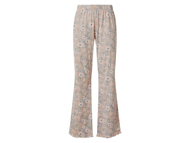 Dames pyjamabroek met bloemenprint in beige, roze en blauwe tinten.