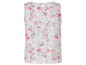 Een witte top met roze bloemenprint.